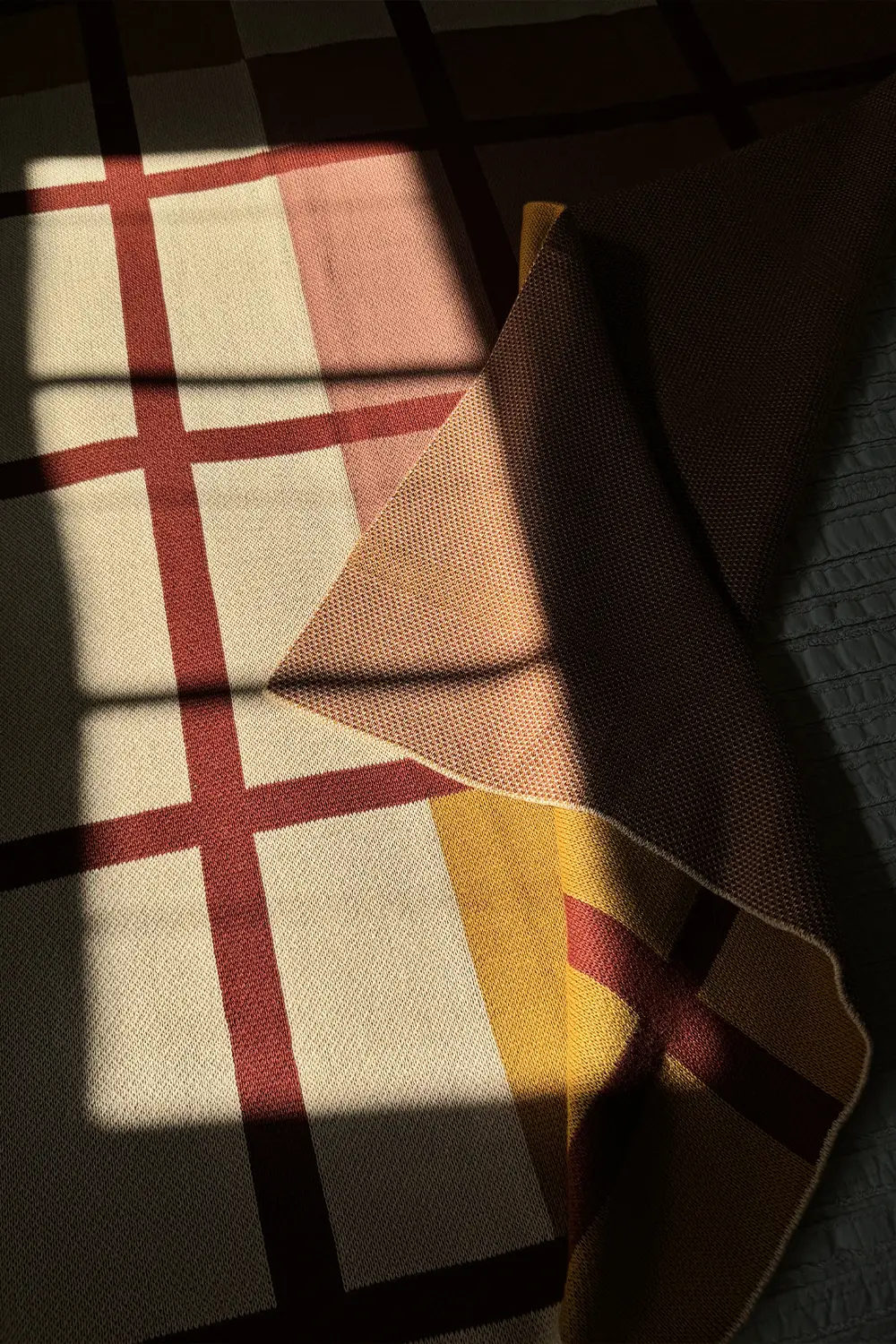 Rust, Camel, and Tan Plaid Organic Cotton Knit Blanket - Image 5