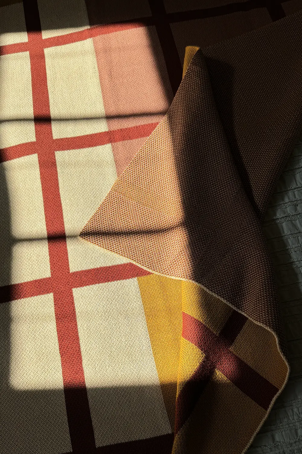 Rust, Camel, and Tan Plaid Organic Cotton Knit Blanket - Image 7