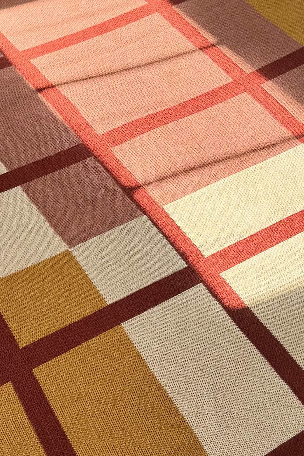 Rust, Camel, and Tan Plaid Organic Cotton Knit Blanket - Image 8